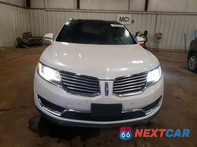 Piąte zdjęcie samochodu w środku: 2016 LINCOLN MKX RESERVE VIN:2LMTJ8LP0GBL68270 - miniatura