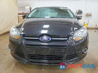 Piąte zdjęcie samochodu w środku: 2013 FORD FOCUS TITANIUM VIN:1FADP3N24DL304015 - miniatura
