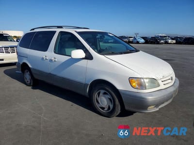 Czwarte zdjęcie samochodu z boku: 2003 TOYOTA SIENNA XLE VIN:4T3ZF13C83U518231 - miniatura