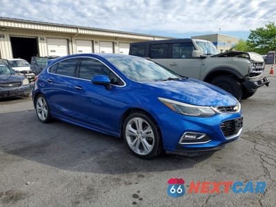 Czwarte zdjęcie samochodu z boku: 2017 CHEVROLET CRUZE PREMIER VIN:3G1BF6SM9HS535609 - miniatura
