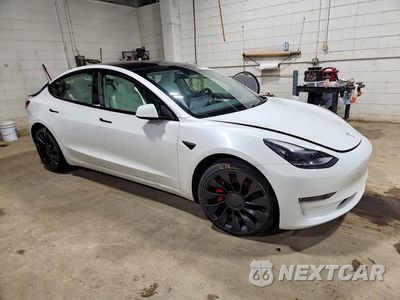 Czwarte zdjęcie samochodu z boku: 2023 TESLA MODEL 3 VIN:5YJ3E1EC9PF504503 - miniatura