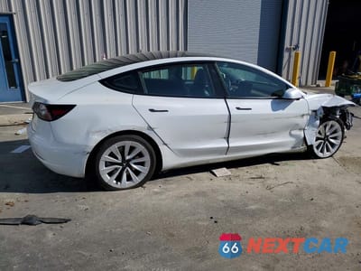 Trzecie zdjęcie samochodu z tyłu: 2022 TESLA MODEL 3 VIN:5YJ3E1EB0NF158491 - miniatura