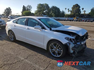 Czwarte zdjęcie samochodu z boku: 2016 FORD FUSION TITANIUM VIN:3FA6P0K96GR281531 - miniatura