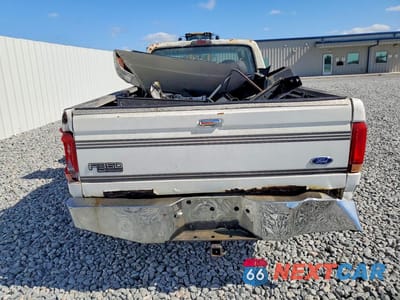 Zdjęcie 6 z 12 samochodu: 1997 FORD F350 VIN:1FTJW35F2VEA53097 - miniatura