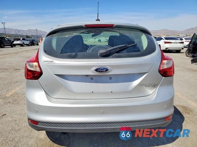 Zdjęcie 6 z 13 samochodu: 2014 FORD FOCUS TITANIUM VIN:1FADP3N26EL299837 - miniatura
