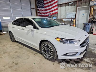 Czwarte zdjęcie samochodu z boku: 2017 FORD FUSION TITANIUM VIN:3FA6P0K98HR118087 - miniatura