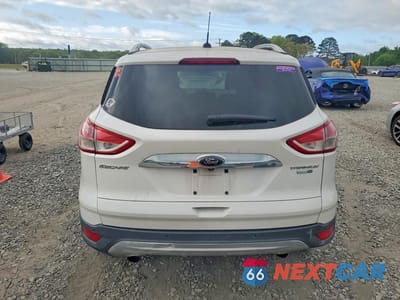 Zdjęcie 6 z 13 samochodu: 2014 FORD ESCAPE TITANIUM VIN:1FMCU9J91EUE34085 - miniatura