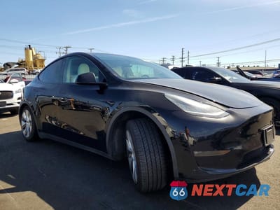 Czwarte zdjęcie samochodu z boku: 2021 TESLA MODEL Y VIN:5YJYGDEE6MF144802 - miniatura