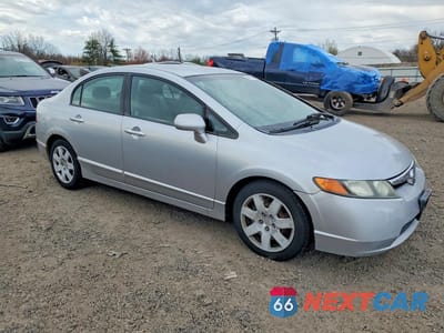 Czwarte zdjęcie samochodu z boku: 2007 HONDA CIVIC LX VIN:2HGFA16517H302002 - miniatura