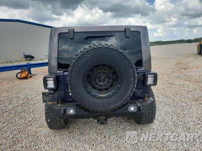 Zdjęcie 6 z 13 samochodu: 2013 JEEP WRANGLER UNLIMITED SAHARA VIN:1C4BJWEG6DL547454 - miniatura