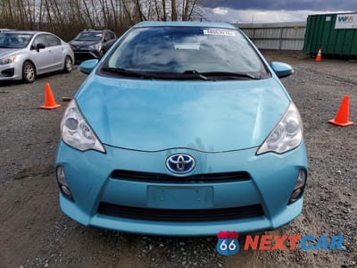 Piąte zdjęcie samochodu w środku: 2014 TOYOTA PRIUS C FOUR VIN:JTDKDTB38E1067338 - miniatura