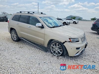 Czwarte zdjęcie samochodu z boku: 2014 JEEP GRAND CHEROKEE SUMMIT VIN:1C4RJFJM7EC299033 - miniatura