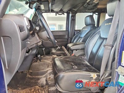 Zdjęcie 7 z 13 samochodu: 2013 JEEP WRANGLER UNLIMITED SAHARA VIN:1C4BJWEG3DL552465 - miniatura