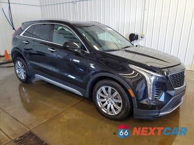 Czwarte zdjęcie samochodu z boku: 2020 CADILLAC XT4 PREMIUM LUXURY VIN:1GYFZDR44LF055088 - miniatura