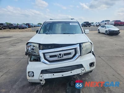 Piąte zdjęcie samochodu w środku: 2011 HONDA PILOT EXL VIN:5FNYF3H51BB006834 - miniatura