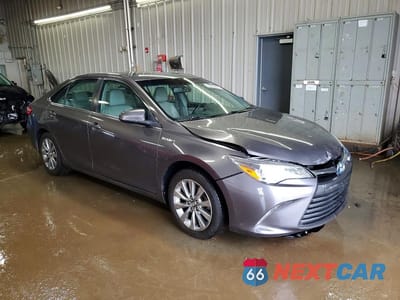 Czwarte zdjęcie samochodu z boku: 2017 TOYOTA CAMRY HYBRID XLE VIN:4T1BD1FK9HU212441 - miniatura