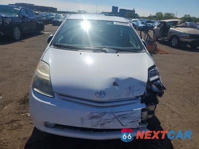 Piąte zdjęcie samochodu w środku: 2004 TOYOTA PRIUS BASE VIN:JTDKB20U540095937 - miniatura