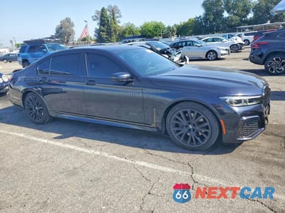 Czwarte zdjęcie samochodu z boku: 2021 BMW 740 I VIN:WBA7T2C05MCE98648 - miniatura