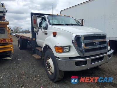 Czwarte zdjęcie samochodu z boku: 2015 FORD F750 SUPER DUTY VIN:3FRNF7FC6FV730013 - miniatura