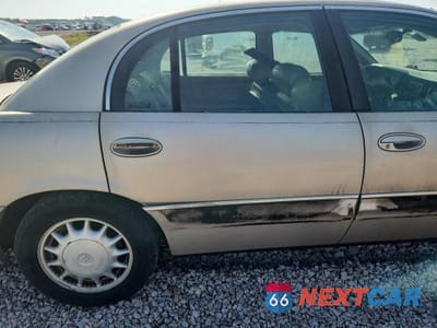 Zdjęcie 10 z 13 samochodu: 1998 BUICK PARK AVENUE VIN:1G4CW52K4W4636750 - miniatura