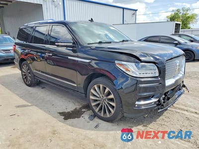 Czwarte zdjęcie samochodu z boku: 2018 LINCOLN NAVIGATOR SELECT VIN:5LMJJ2HT5JEL11237 - miniatura