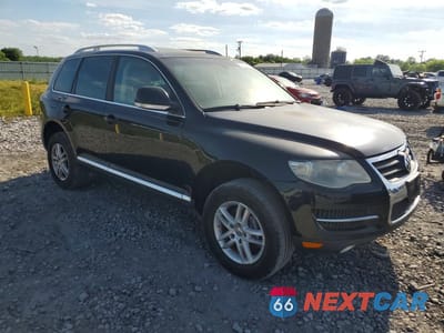 Czwarte zdjęcie samochodu z boku: 2009 VOLKSWAGEN TOUAREG 2 V6 VIN:WVGBE77L99D003547 - miniatura
