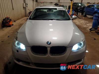 Piąte zdjęcie samochodu w środku: 2010 BMW 335 XI VIN:WBAWC7C53AE271119 - miniatura