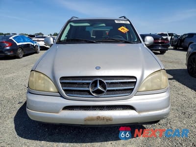Piąte zdjęcie samochodu w środku: 2000 MERCEDES-BENZ ML 430 VIN:4JGAB72E8YA194018 - miniatura