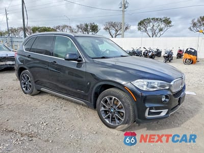 Czwarte zdjęcie samochodu z boku: 2017 BMW X5 XDR40E VIN:5UXKT0C31H0V95991 - miniatura