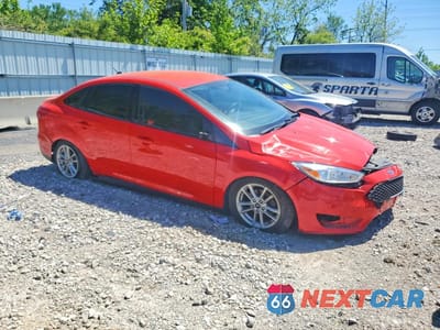 Czwarte zdjęcie samochodu z boku: 2016 FORD FOCUS SE VIN:1FADP3F25GL365294 - miniatura