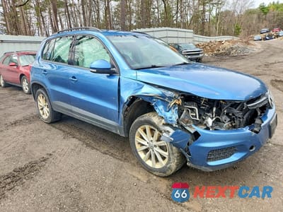 Czwarte zdjęcie samochodu z boku: 2017 VOLKSWAGEN TIGUAN VIN:WVGBV7AX1HK048357 - miniatura