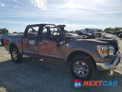 Czwarte zdjęcie samochodu z boku: 2022 FORD F150 SUPERCREW VIN:1FTFW1E80NFA86508 - miniatura