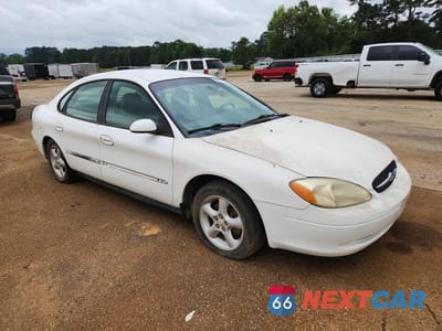 Czwarte zdjęcie samochodu z boku: 2001 FORD TAURUS SE VIN:1FAFP53U01A110758 - miniatura