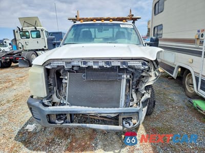 Piąte zdjęcie samochodu w środku: 2011 FORD F350 SUPER DUTY DUMP TRUCK VIN:1FDBF3E69BEB77203 - miniatura