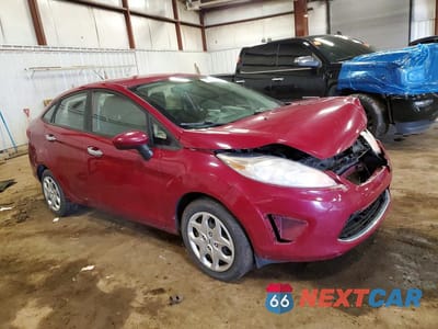 Czwarte zdjęcie samochodu z boku: 2011 FORD FIESTA SE VIN:3FADP4BJ1BM188558 - miniatura