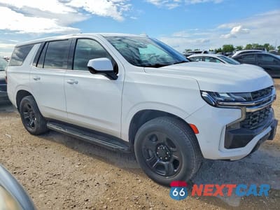 Czwarte zdjęcie samochodu z boku: 2022 CHEVROLET TAHOE C1500 VIN:1GNSCLEDXNR247372 - miniatura