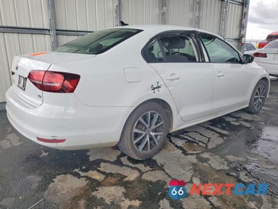 Trzecie zdjęcie samochodu z tyłu: 2016 VOLKSWAGEN JETTA SE VIN:3VWD67AJ6GM360202 - miniatura