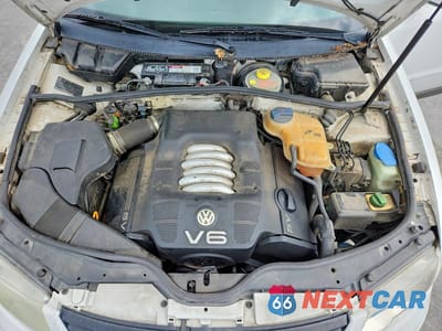 Zdjęcie 11 z 12 samochodu: 1999 VOLKSWAGEN PASSAT GLX VIN:WVWPD63B0XE491640 - miniatura