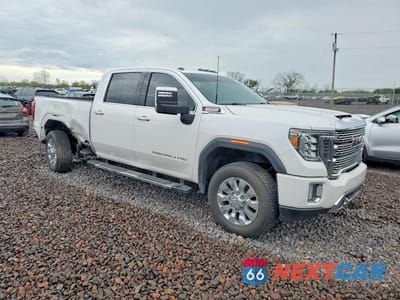 Czwarte zdjęcie samochodu z boku: 2020 GMC SIERRA K2500 DENALI VIN:1GT49REY3LF113033 - miniatura