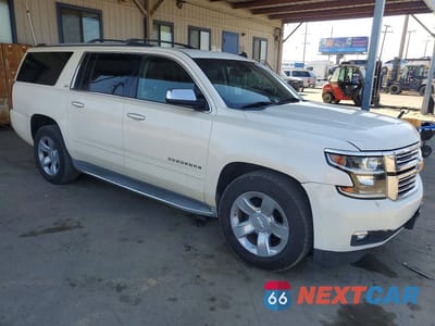 Czwarte zdjęcie samochodu z boku: 2015 CHEVROLET SUBURBAN C1500 LTZ VIN:1GNSCKKC4FR145881 - miniatura
