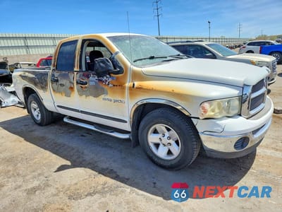 Czwarte zdjęcie samochodu z boku: 2002 DODGE RAM 1500 VIN:3D7HA18N52G140555 - miniatura