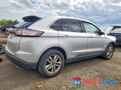 Trzecie zdjęcie samochodu z tyłu: 2016 FORD EDGE SEL VIN:2FMPK3J9XGBC49076 - miniatura