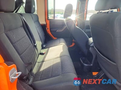 Zdjęcie 11 z 12 samochodu: 2012 JEEP WRANGLER UNLIMITED SPORT VIN:1C4BJWDG0CL244637 - miniatura