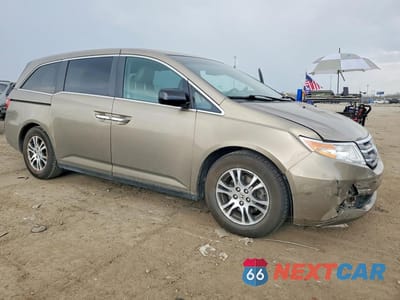 Czwarte zdjęcie samochodu z boku: 2012 HONDA ODYSSEY EXL VIN:5FNRL5H66CB127040 - miniatura