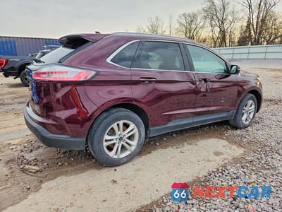 Trzecie zdjęcie samochodu z tyłu: 2020 FORD EDGE SEL VIN:2FMPK4J98LBB16607 - miniatura