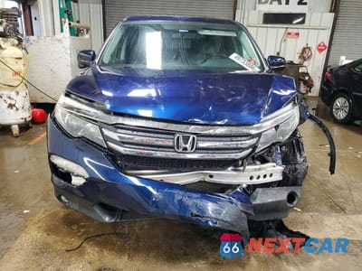 Piąte zdjęcie samochodu w środku: 2016 HONDA PILOT EXLN VIN:5FNYF6H7XGB115514 - miniatura