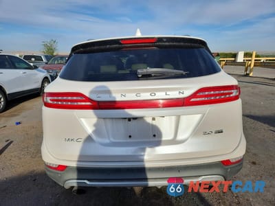 Zdjęcie 6 z 13 samochodu: 2015 LINCOLN MKC VIN:5LMCJ2A92FUJ38054 - miniatura