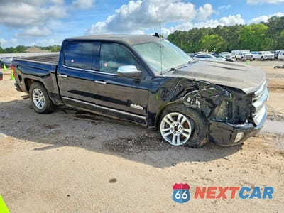 Czwarte zdjęcie samochodu z boku: 2018 CHEVROLET SILVERADO 1500 HIGH COUNTRY 4WD VIN:3GCUKTEC1JG420475 - miniatura