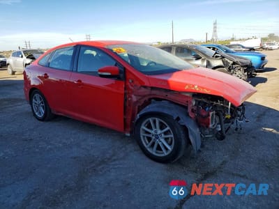 Czwarte zdjęcie samochodu z boku: 2017 FORD FOCUS SE VIN:1FADP3F28HL334509 - miniatura