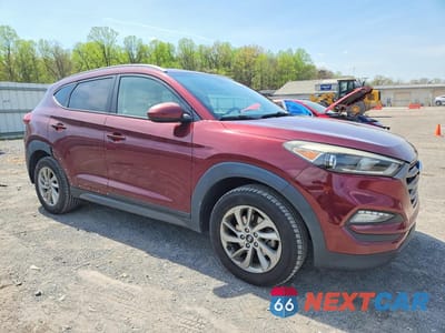 Czwarte zdjęcie samochodu z boku: 2016 HYUNDAI TUCSON SE VIN:KM8J3CA48GU223416 - miniatura